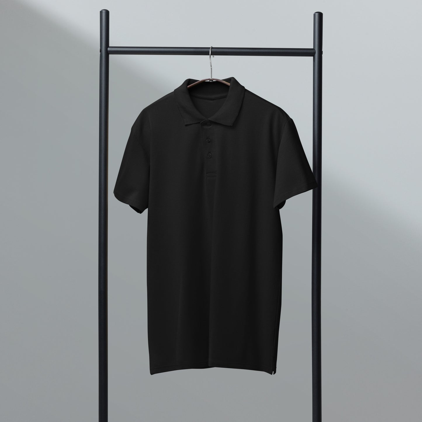 Unisex black Piqué polo shirt by Craftklart with a classic fit, showing the front view and textured fabric details.