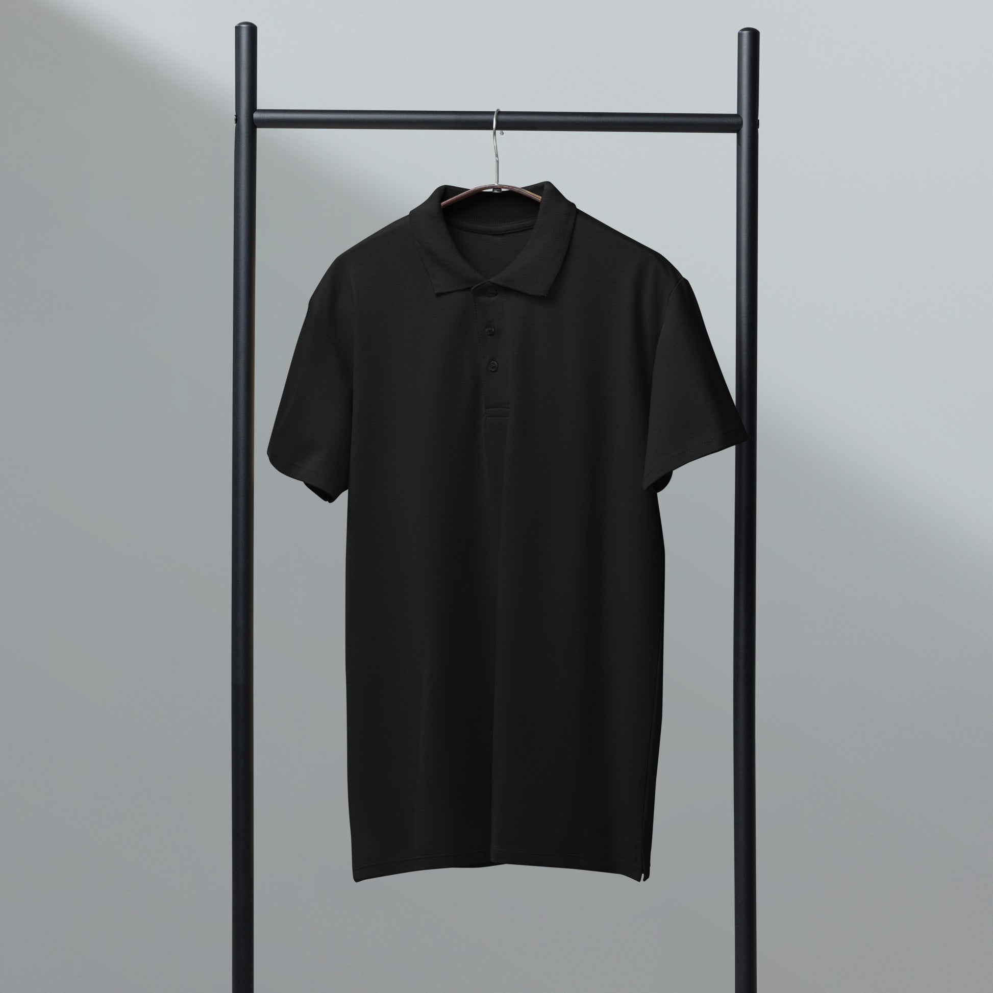 Unisex black Piqué polo shirt by Craftklart with a classic fit, showing the front view and textured fabric details.