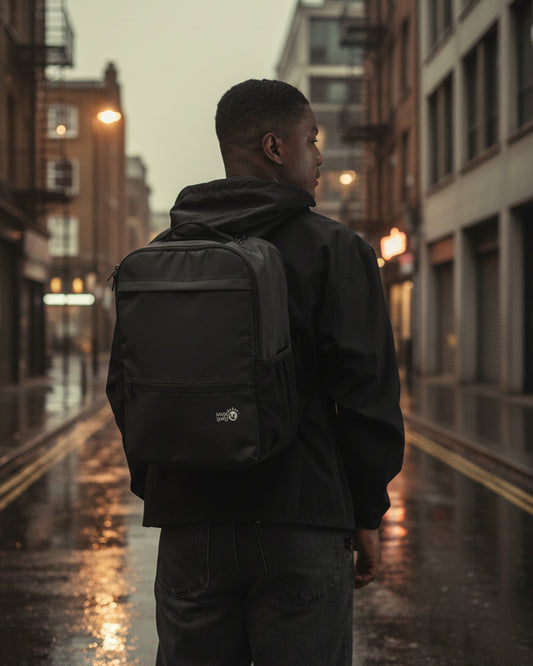 Urban Utility Backpack by Urban Fashion & Streetwear featuring all-over print design, black fabric, and a spacious laptop compartment.