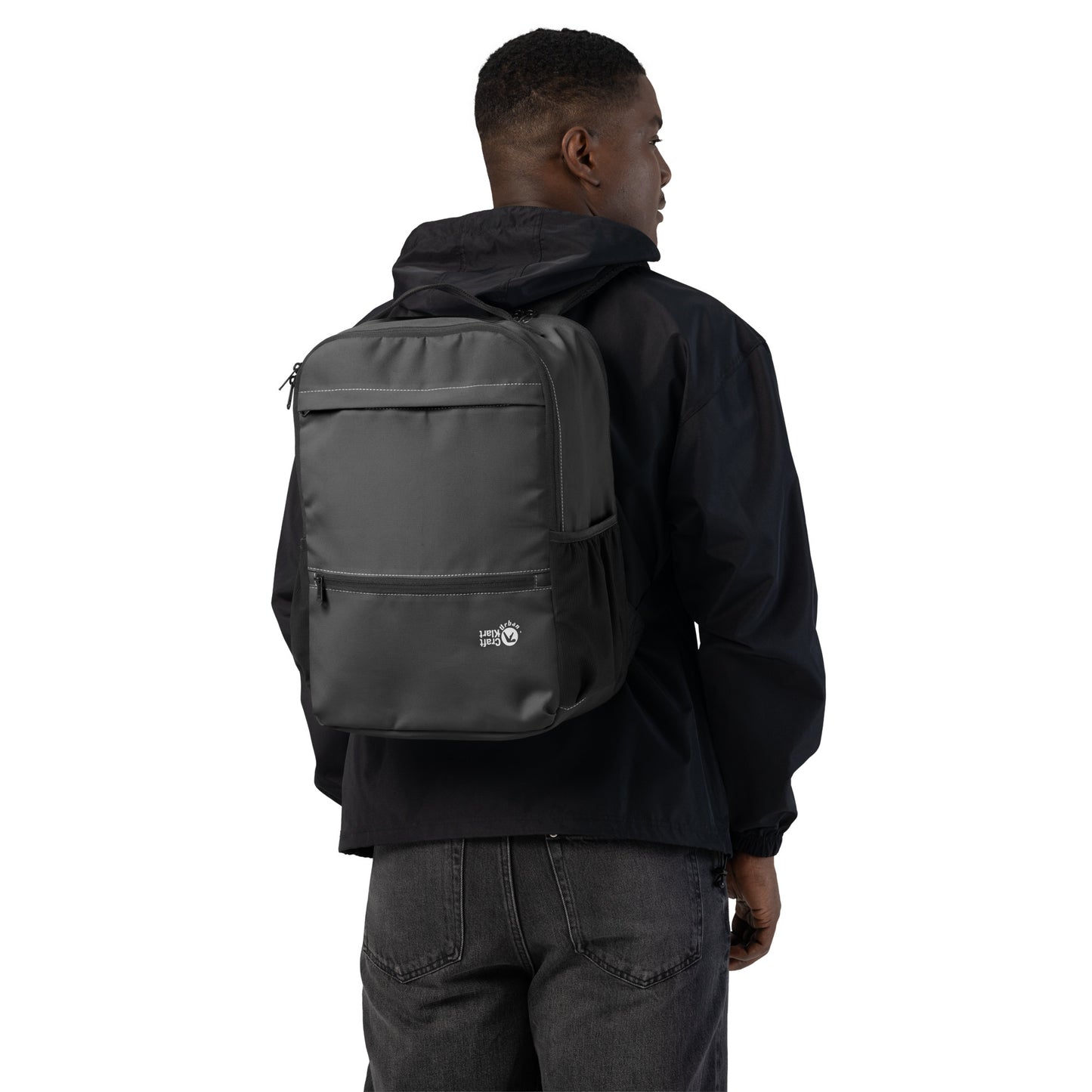 Urban Utility Backpack by Craftklart, all-over print black backpack with padded laptop compartment and streetwear-inspired design.
