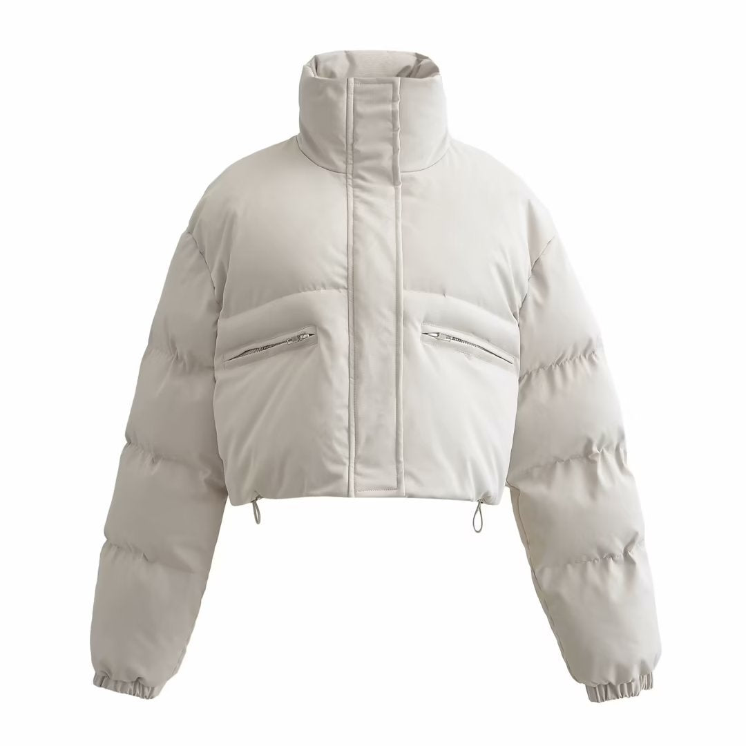 Urban Fashion & Streetwear | Craftklart beige cropped puffer jacket with a high stand-up collar and zippered pockets.