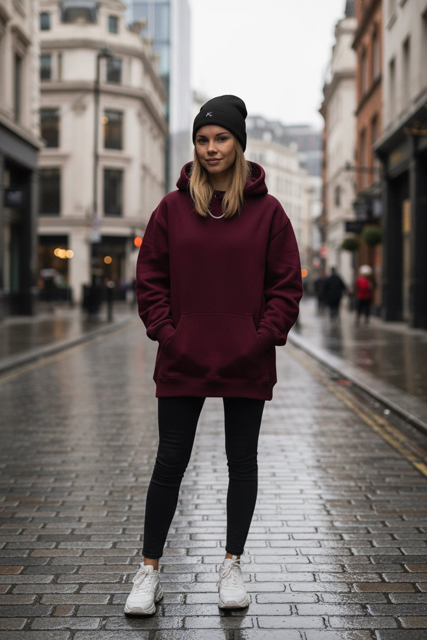Woman wearing a black Urban Fashion & Streetwear | Craftklart embroidered beanie with a snug, form-fitting design.