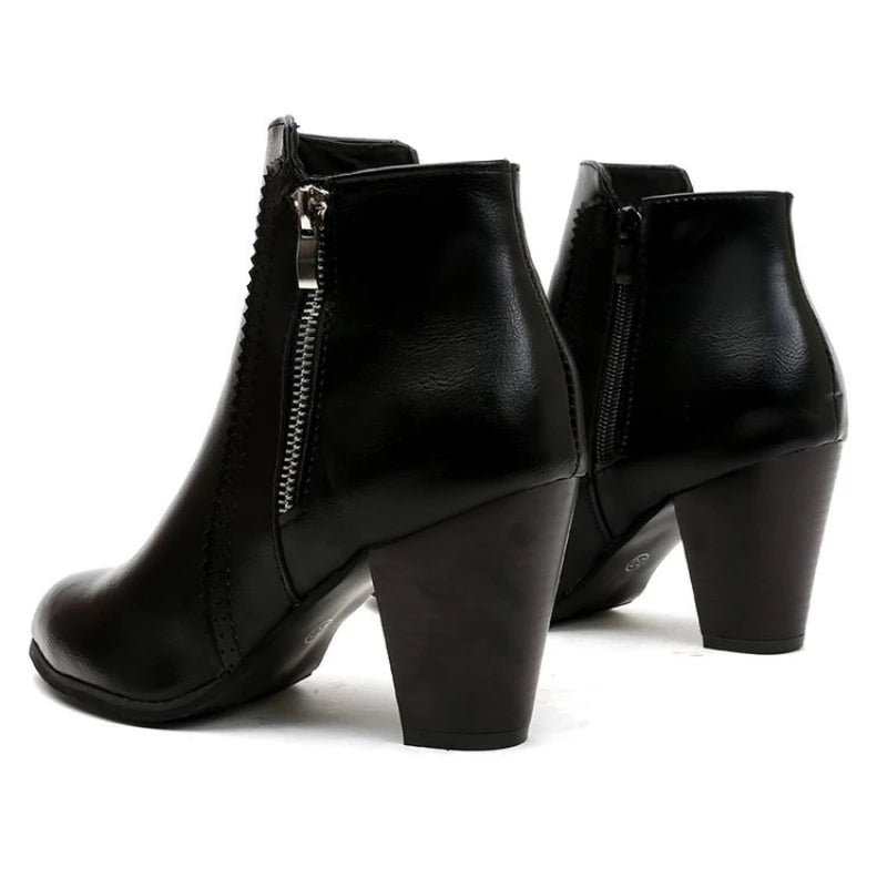 Black women's heeled ankle boots from Duskline by Craftklart, showcasing urban streetwear style with a sleek design.