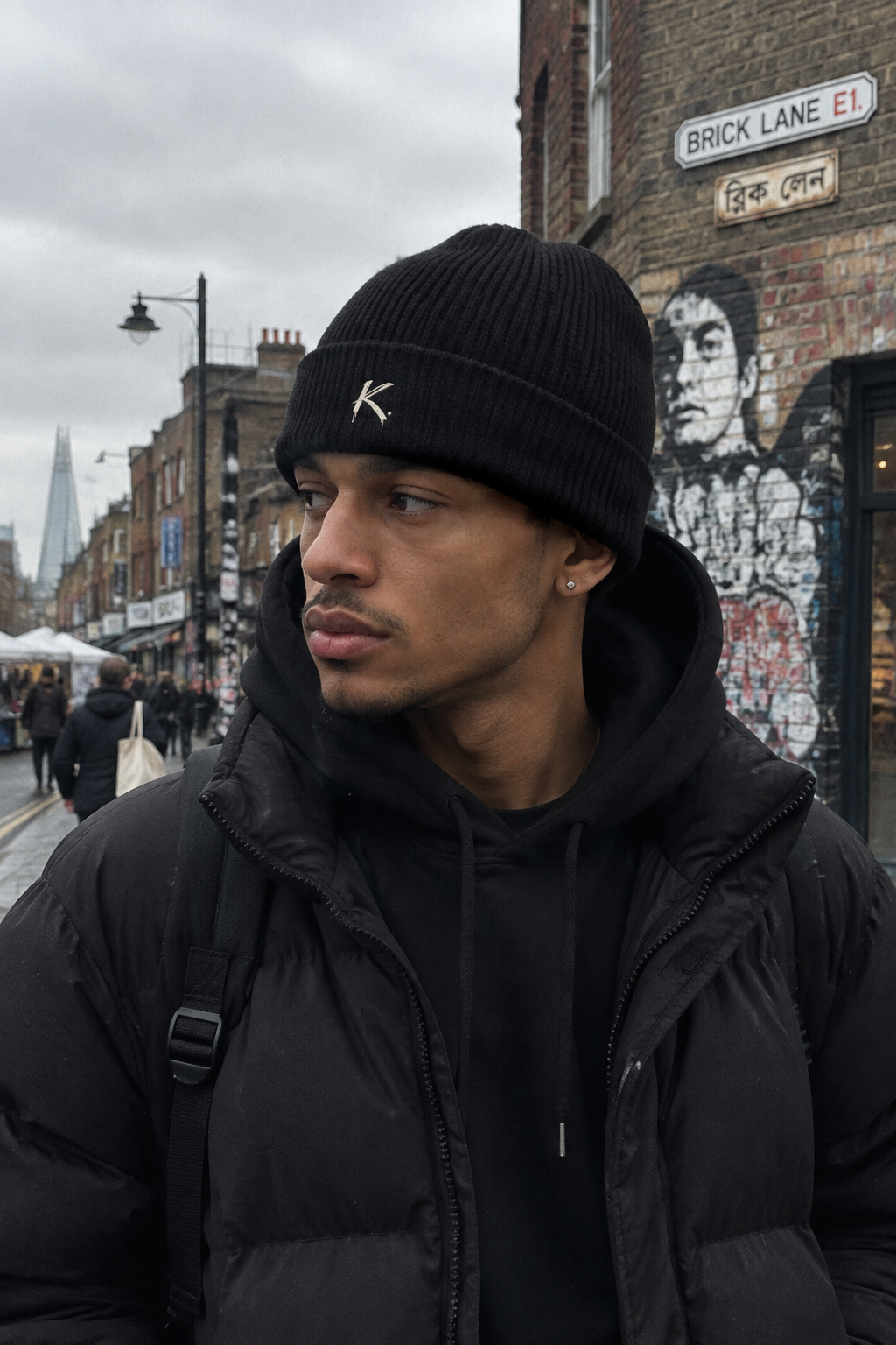 Black Craftklart Signature Ribbed Knit Beanie, urban streetwear style, snug fit with ribbed knit texture.