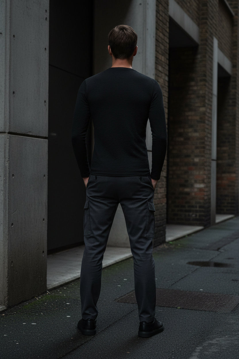 Back view of a black Urban Fashion & Streetwear | Craftklart long sleeve performance shirt with raglan sleeves.