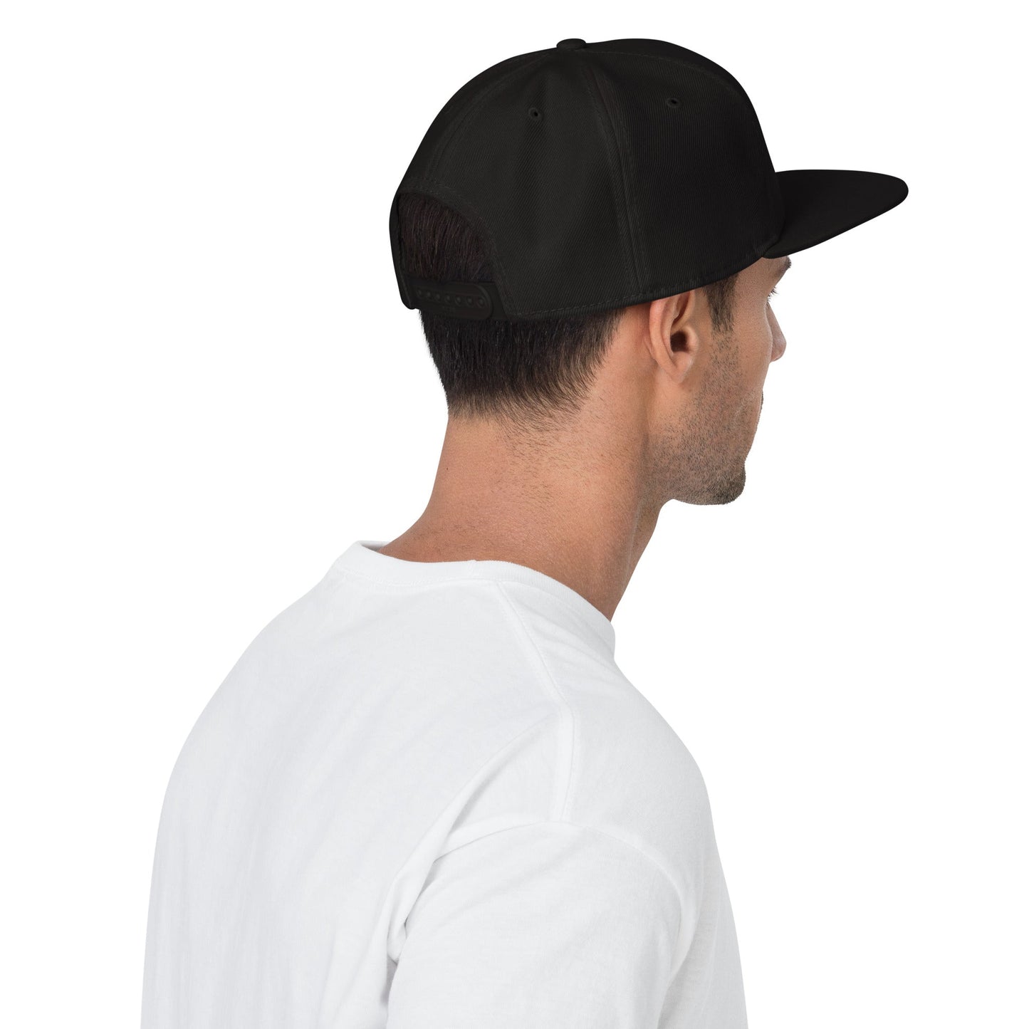 Urban Fashion & Streetwear | Craftklart black six-panel snapback cap with flat visor worn by a man from behind