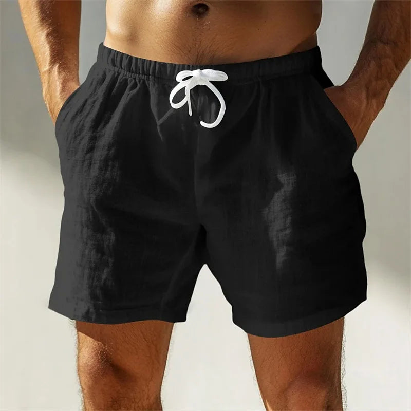Men's black loose linen shorts by Urban Fashion & Streetwear, breathable cotton-linen fabric, elastic waistband, casual summer style.