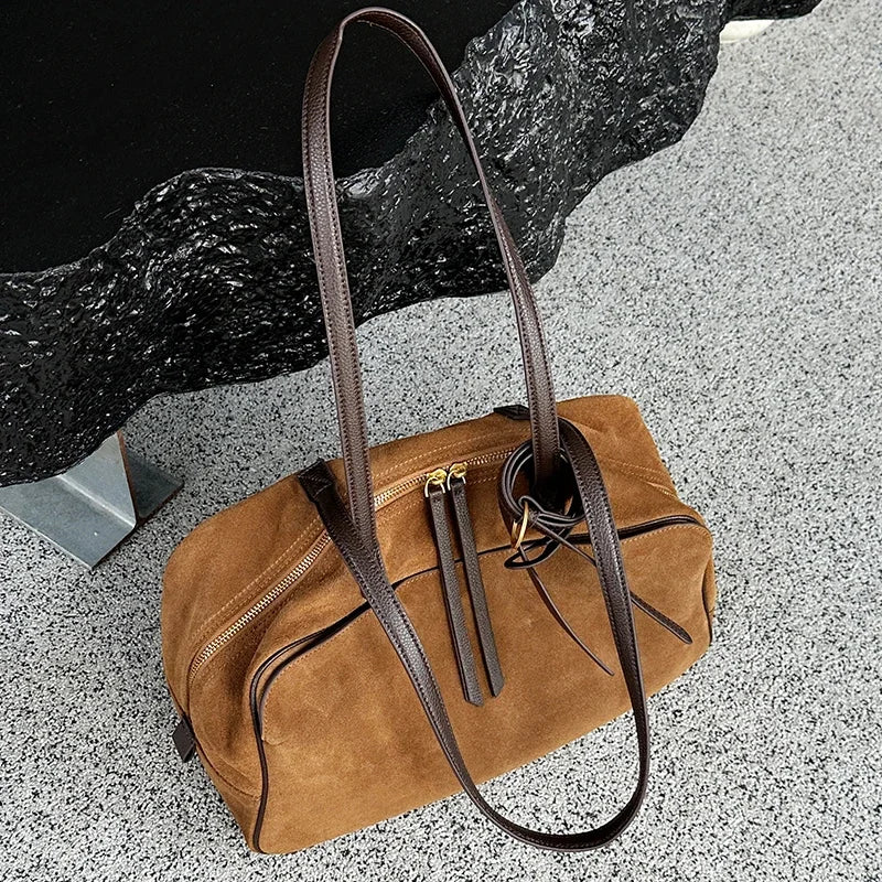 Brown Craftklart structured leather tote bag with suede accents, large capacity, ideal for urban fashion and commuting.