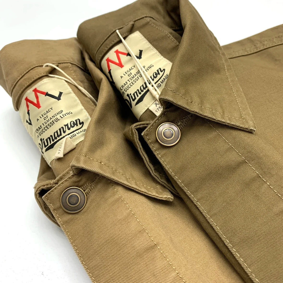 Urban Fashion & Streetwear | Craftklart brown cotton workwear jacket with turn-down collar and metal button detail.