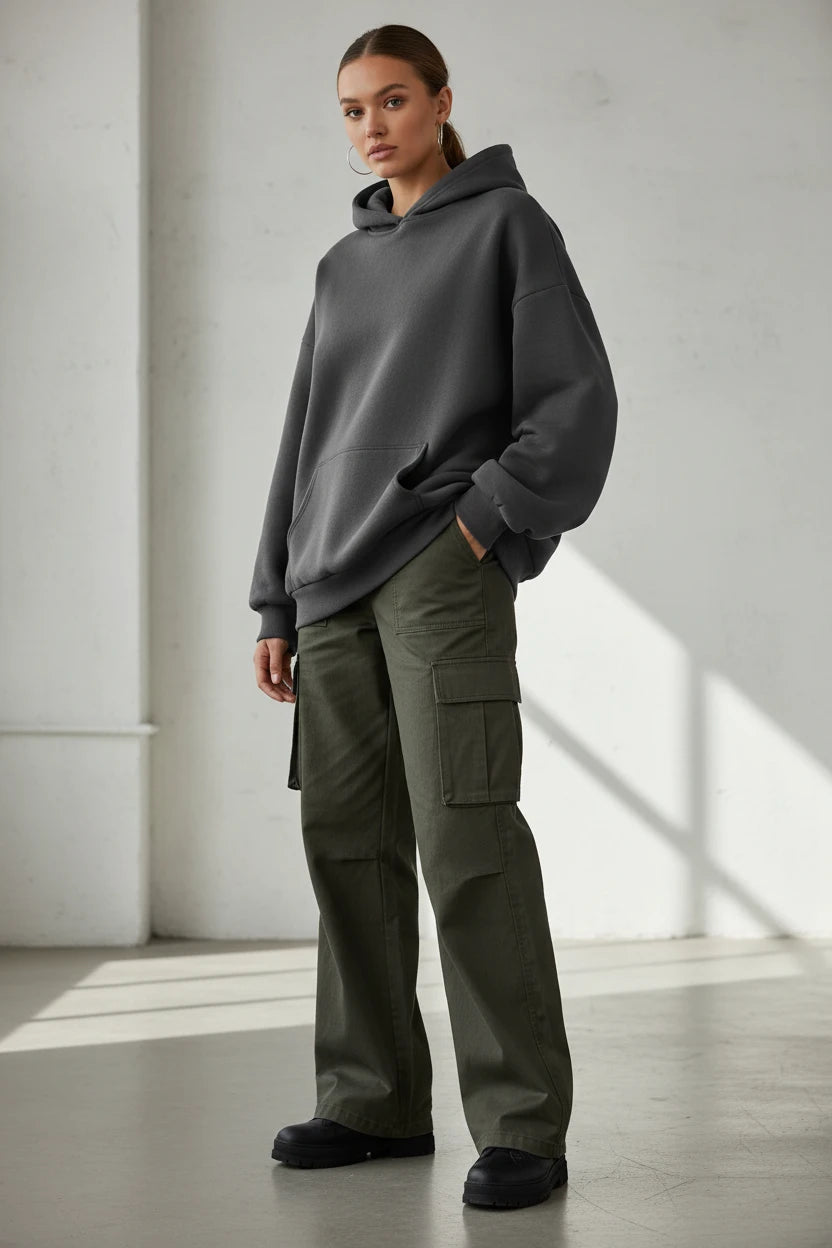 Black oversized hoodie sweatshirt by Urban Fashion & Streetwear, featuring a relaxed fit, long sleeves, and a drawstring hood.