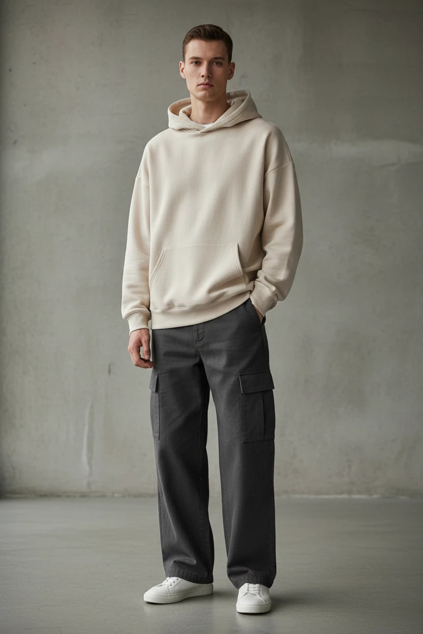 Black oversized unisex hoodie sweatshirt from Urban Fashion & Streetwear for spring 2026, featuring a relaxed fit and bold design.