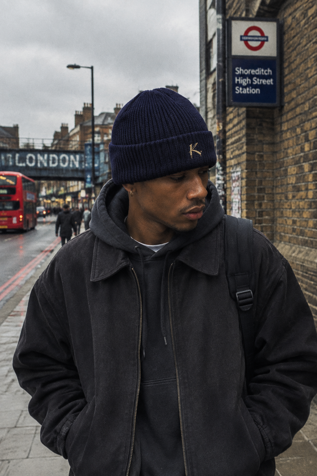 Navy Craftklart Signature Ribbed Knit Beanie, urban streetwear style, close-up of textured knit fabric and folded brim.