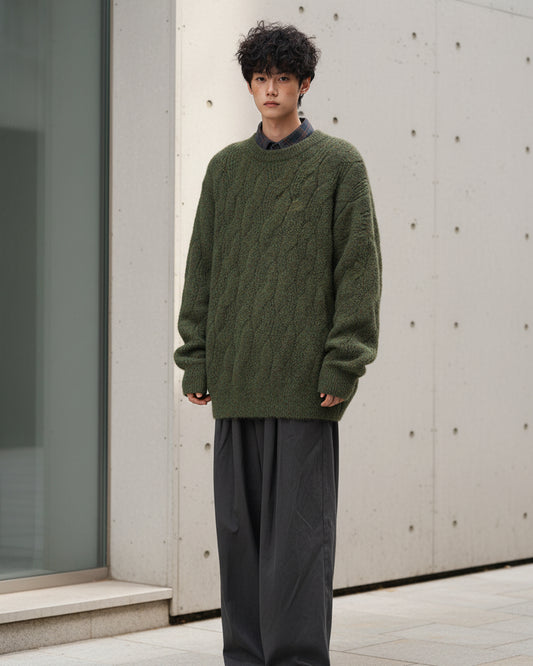 Urban Fashion & Streetwear | Craftklart oversized olive green cable knit sweater on a model against a white background