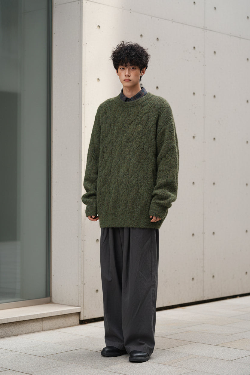 Urban Fashion & Streetwear | Craftklart oversized olive green cable knit sweater on a model against a white background