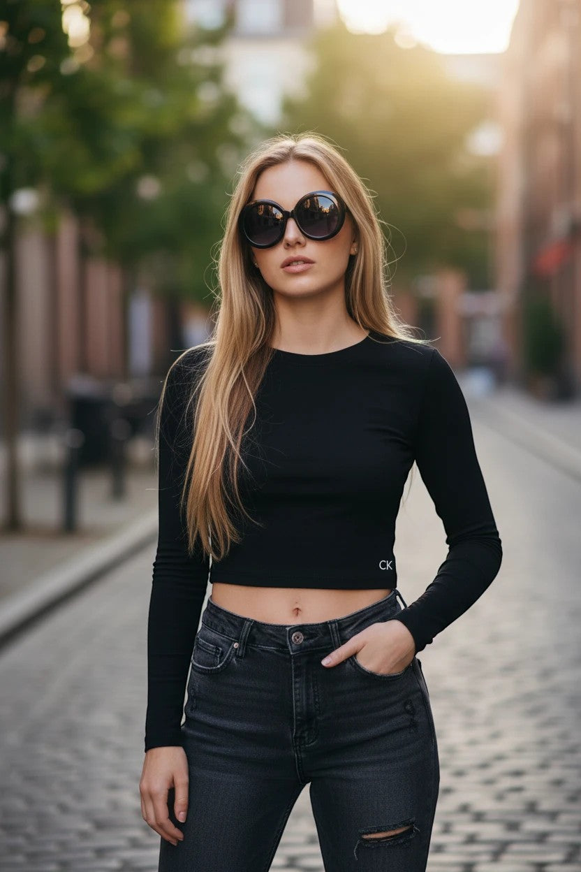 Urban Fashion & Streetwear | Craftklart oversized round sunglasses with black polycarbonate frames on a woman