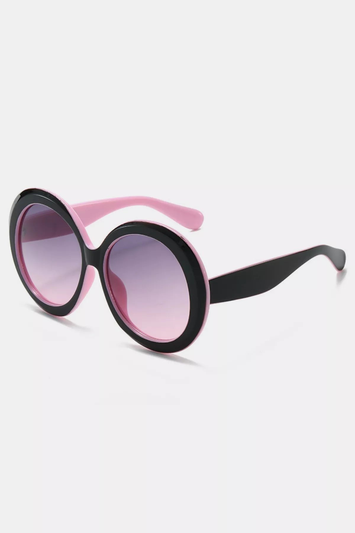 Urban Fashion & Streetwear | Craftklart oversized round sunglasses with black frames and pink gradient UV400 lenses.