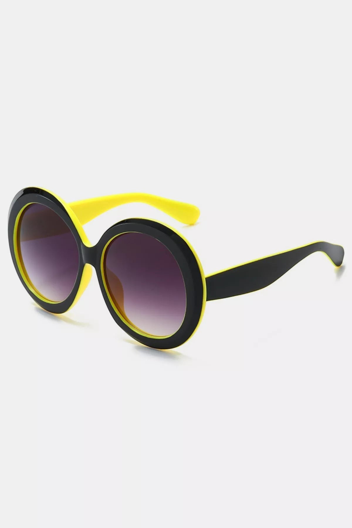 Urban Fashion & Streetwear | Craftklart oversized round sunglasses with black and yellow polycarbonate frames.