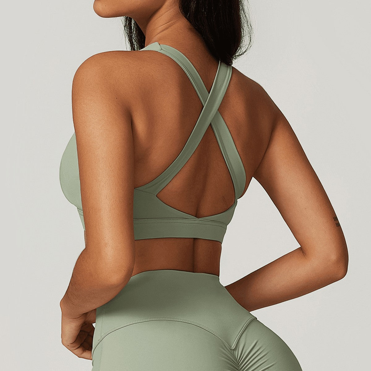 Urban Fashion & Streetwear | Craftklart sage green compression sports bra with a stylish crisscross back design