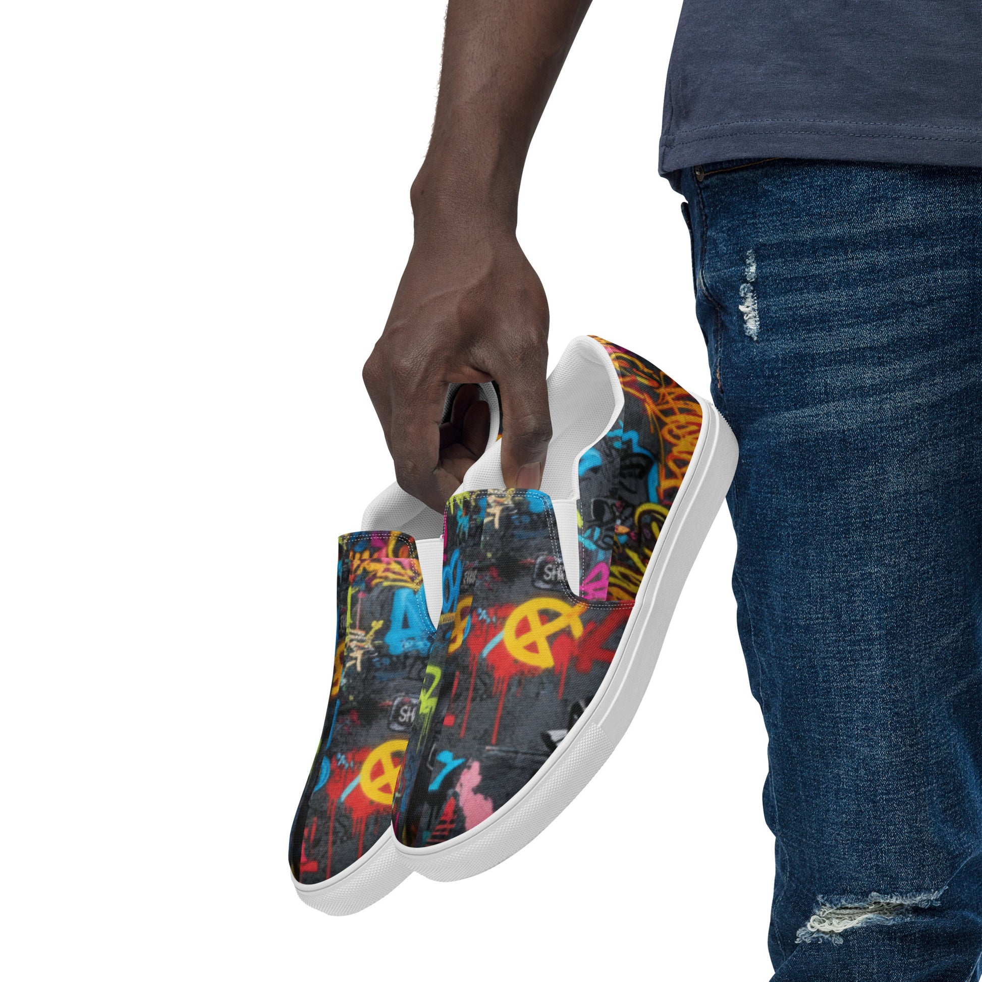 Men’s graffiti slip-on canvas shoes by Urban Fashion & Streetwear Craftklart, featuring bold graffiti designs and comfortable casual style.