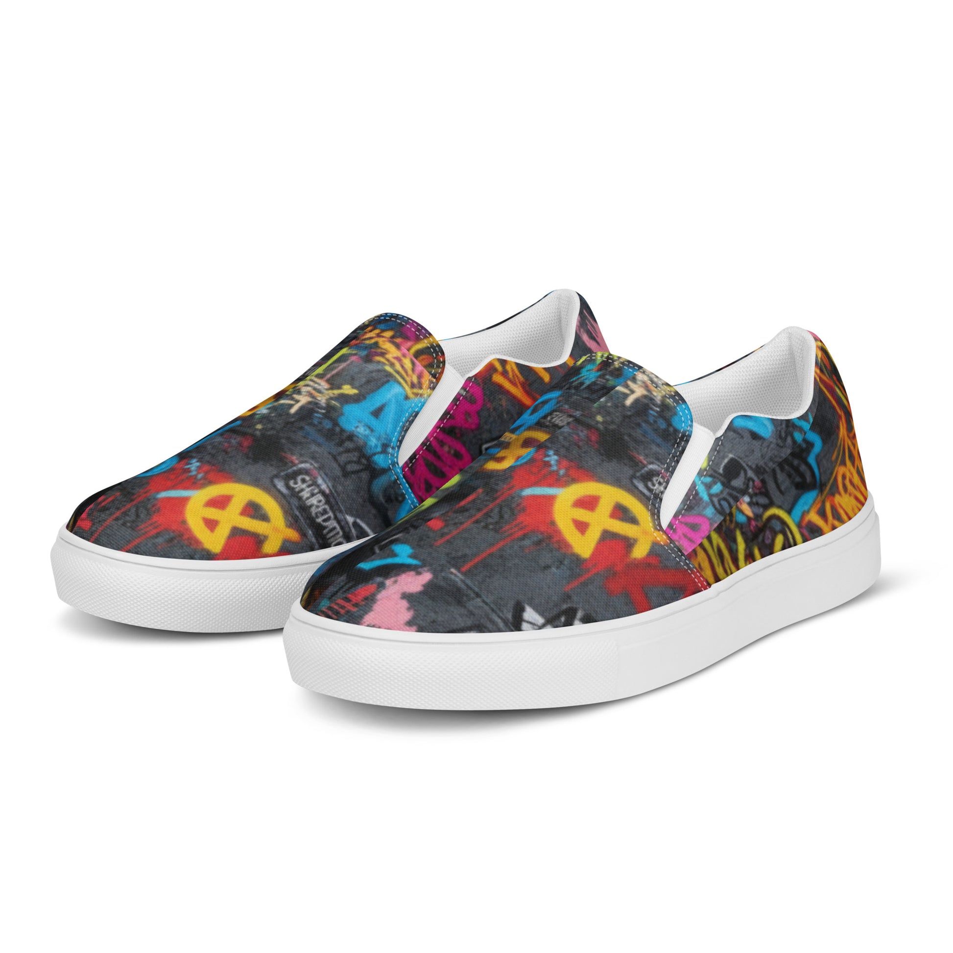 Men’s graffiti slip-on canvas shoes with bold street art design by Urban Fashion & Streetwear Craftklart.