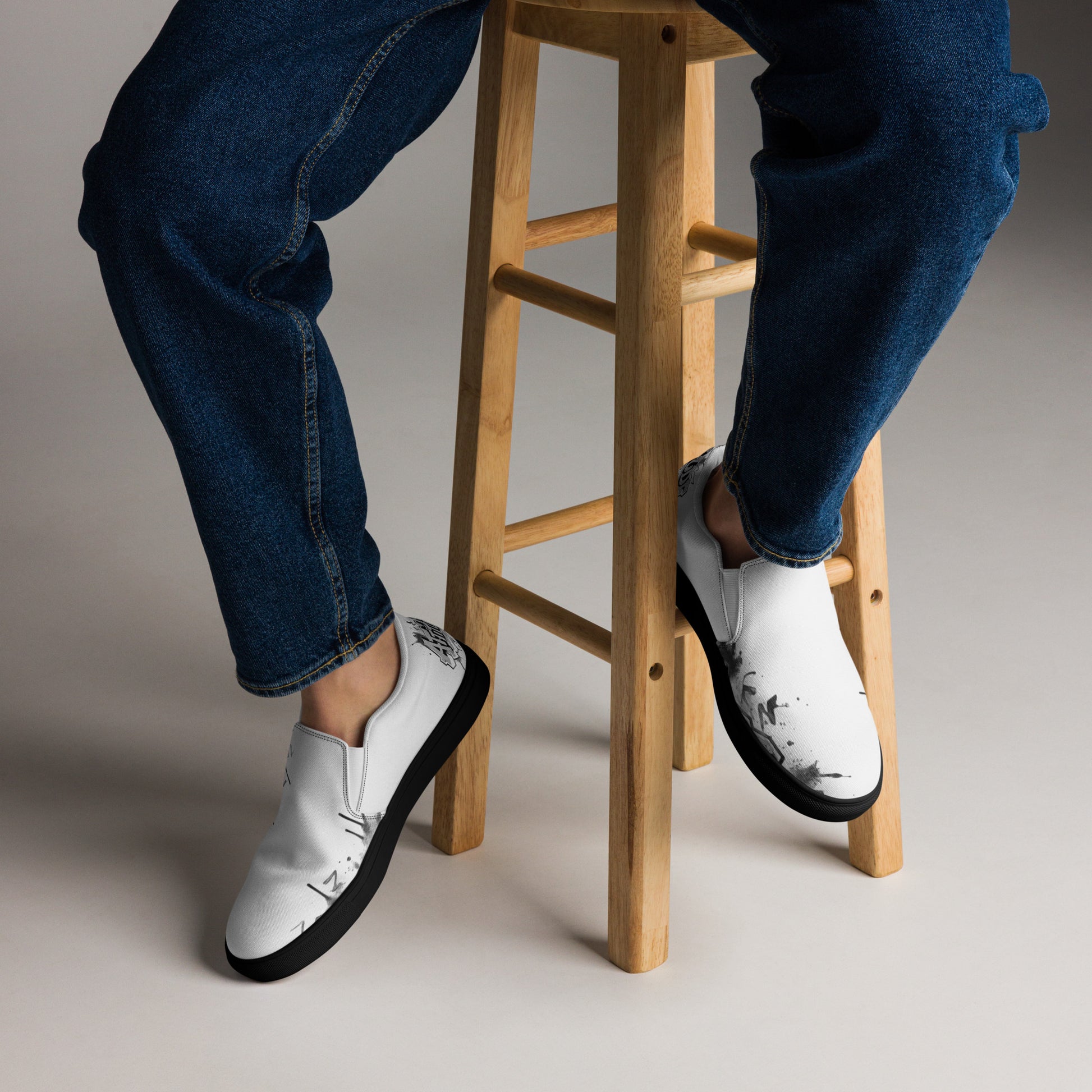 Men's white slip-on canvas shoes by Urban Fashion & Streetwear, featuring a sleek design and comfortable fit.