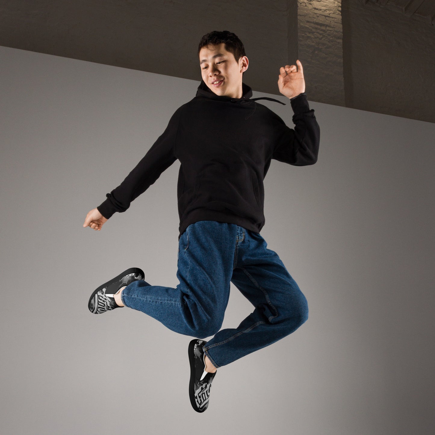 Black Attitude Urban Men’s slip-on canvas shoes with a sleek design, perfect for streetwear and casual urban style.