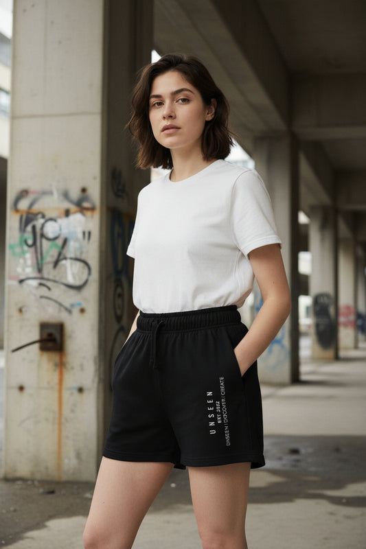 Unseen Ladies Shorts by CKL, stylish denim shorts with a high waist and distressed details, displayed on a neutral background.