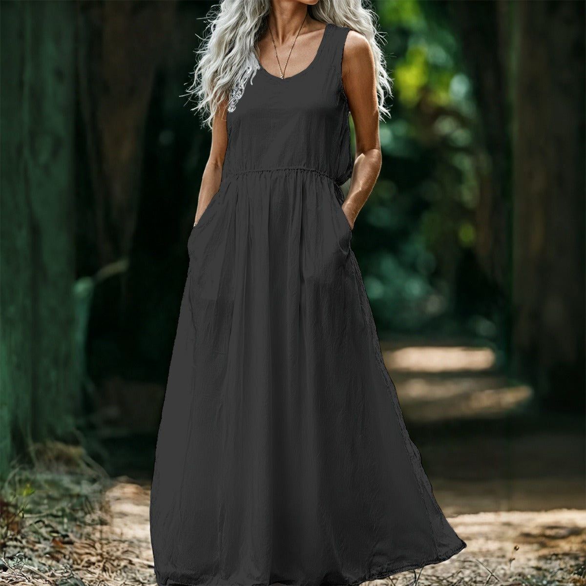 Black Urban Spring women’s sleeveless maxi dress by Yoycol, flowing fabric, stylish summer dress, full-length design.