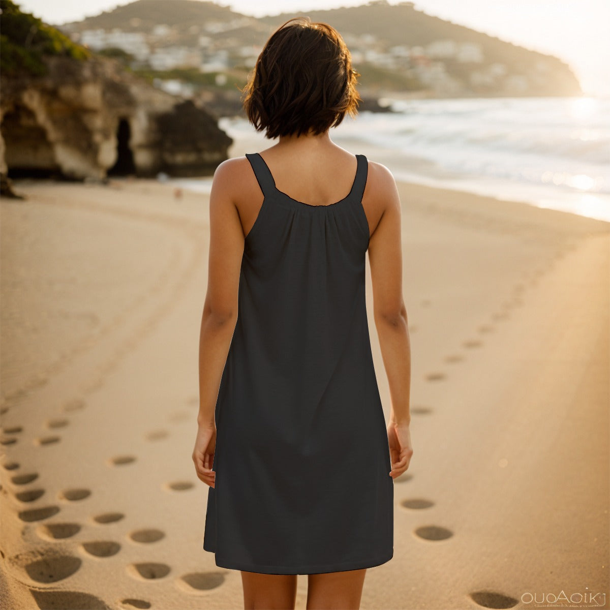Women's black sleeveless cami dress with abstract pattern by Yoycol, featuring a fitted silhouette and sleeveless design.