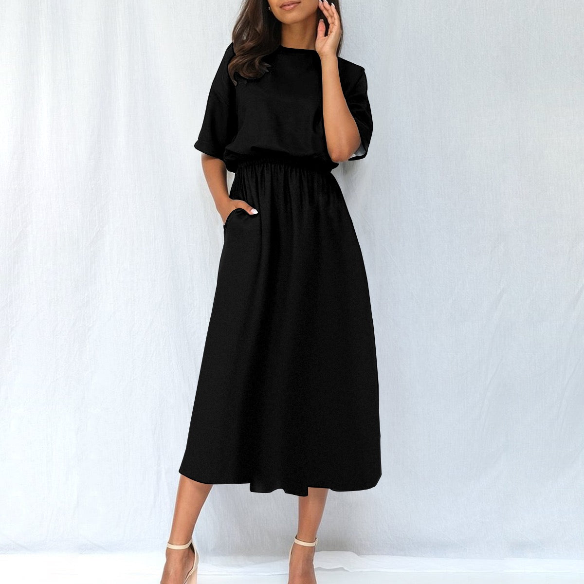 White urban casual women's dress with elastic waist and AOP pattern by Yoycol, shown on a model.